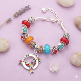 Autism awareness luxury charm bracelet full product view with silver and colored charms
