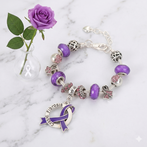 Silver snake chain bracelet with purple glass beads and a central Cystic Fibrosis awareness ribbon charm
