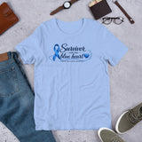 Heather Carolina Blue Blue Heart Human Trafficking Awareness Unisex T-Shirt featuring a blue awareness ribbon and heart design