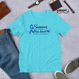 Turquoise Blue Heart Human Trafficking Awareness Unisex T-Shirt featuring a blue awareness ribbon and heart design
