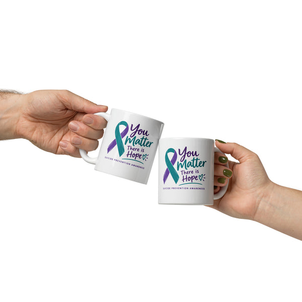White glossy 11 oz mug with "You Matter. There is Hope" suicide prevention awareness message on the front.